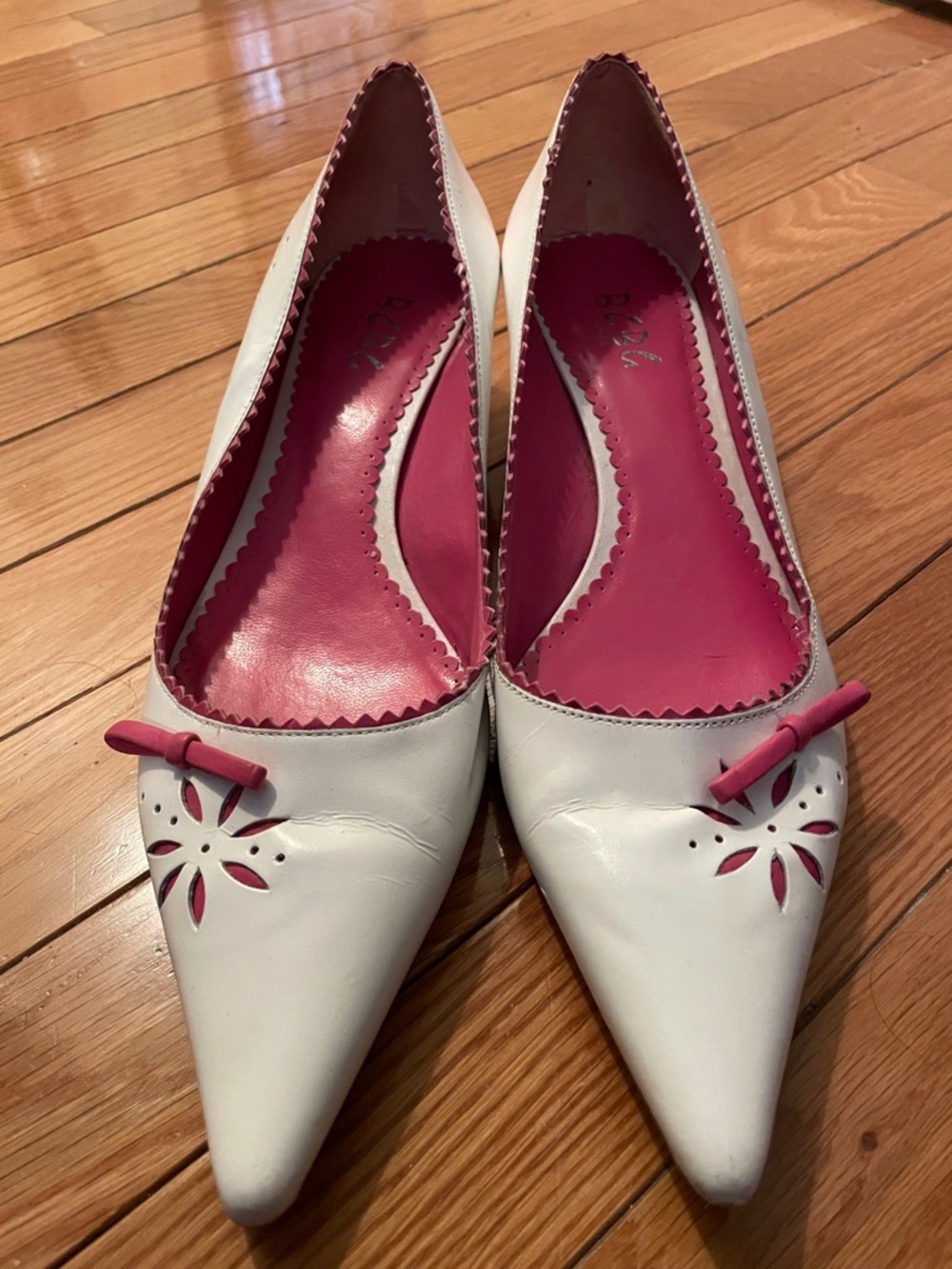 BCBG White Pointed Toe Flats with Pink Interior and Bow Accents